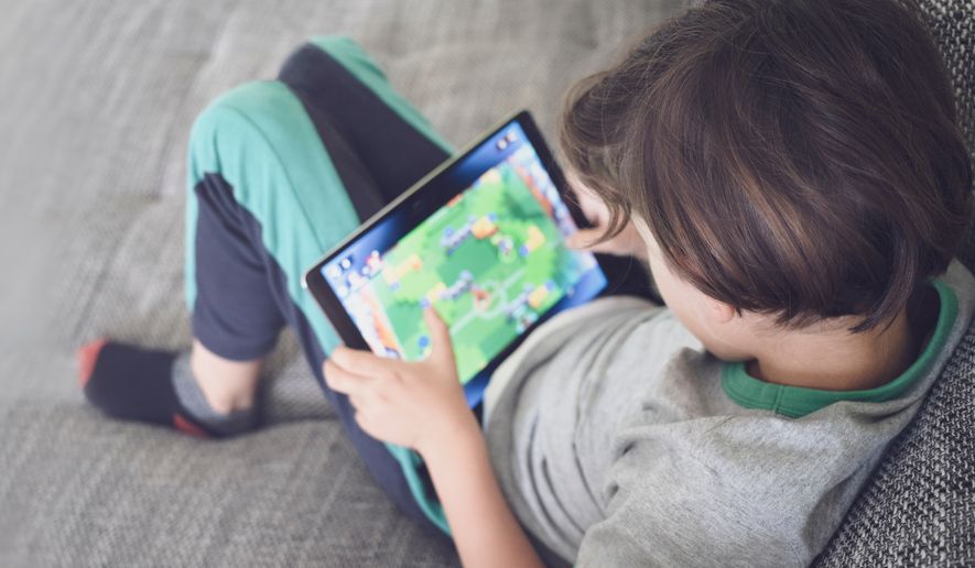 kids and screen time. Photo credit: ozrimoz via Shutterstock