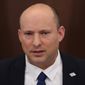 Israeli Prime Minister Naftali Bennett attends a cabinet meeting at the prime minister&#39;s office in Jerusalem, Sunday, May 15, 2022. (Abir Sultan/Pool Photo via AP)