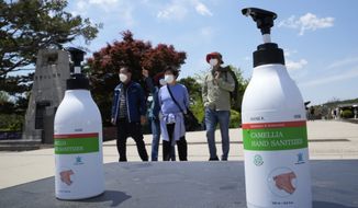 Bottles of hand sanitizer are placed at the Imjingak Pavilion in Paju, South Korea, near the border with North Korea, Sunday, May 15, 2022. North Korea has confirmed 15 more deaths and hundreds of thousands of additional patients with fevers as it mobilizes more than a million health and other workers to try to suppress the country&#39;s first COVID-19 outbreak, state media reported Sunday. (AP Photo/Ahn Young-joon)