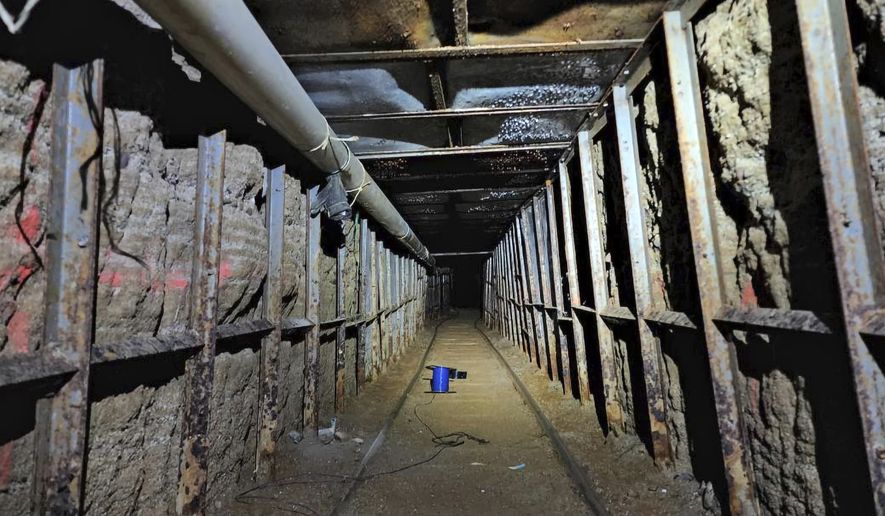 This undated photo provided by Homeland Security Investigations shows the inside of a cross border tunnel between Mexico&#39;s Tijuana into the San Diego area. Authorities announced on Monday, May 16, 2022, the discovery of the underground smuggling tunnel on Mexico&#39;s border, running the length of a football field on U.S. soil to a warehouse in an industrial area. (Homeland Security Investigations via AP) ** FILE **