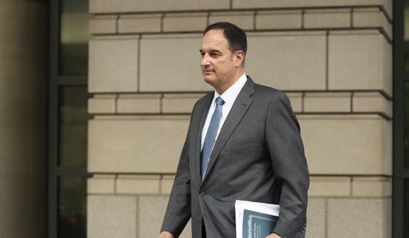 Michael Sussmann, a cybersecurity lawyer who represented the Hillary Clinton presidential campaign in 2016, leaves a federal courthouse in Washington, Monday, May 16, 2022. A jury was picked Monday in the trial of a lawyer for the Hillary Clinton presidential campaign who is accused of lying to the FBI as it investigated potential ties between Donald Trump and Russia in 2016. (AP Photo/Manuel Balce Ceneta)