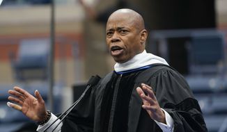 New York City Mayor Eric Adams speaks during a graduation ceremony for Pace University at the USTA Billie Jean King Tennis Center in New York, Monday, May 16, 2022. Pace held its largest graduation ceremony ever, not only hosting the current 2022 graduates but also the classes of 2020 and 2021, which were not allowed to hold graduation ceremonies previously due to the COVID-19 pandemic. (AP Photo/Seth Wenig)
