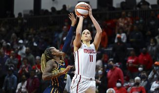 Washington Mystics forward Elena Delle Donne (11) shoots the ball against Indiana Fever guard Tiffany Mitchell (25) during the first half of an WNBA basketball game, Friday, May 6, 2022, in Washington. After two seasons in which she barely played, Washington Mystics star Elena Delle Donne is back -- and still looking like one of the WNBA&#39;s top players. (AP Photo/Terrance Williams, File) **FILE**