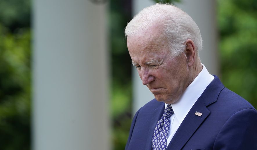President Joe Biden listens in the Rose Garden of the White House in Washington, Tuesday, May 17, 2022, during a reception to celebrate Asian American, Native Hawaiian, and Pacific Islander Heritage Month. (AP Photo/Susan Walsh)