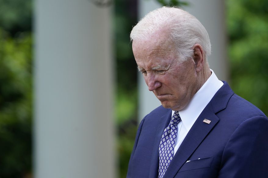 President Joe Biden listens in the Rose Garden of the White House in Washington, Tuesday, May 17, 2022, during a reception to celebrate Asian American, Native Hawaiian, and Pacific Islander Heritage Month. (AP Photo/Susan Walsh)