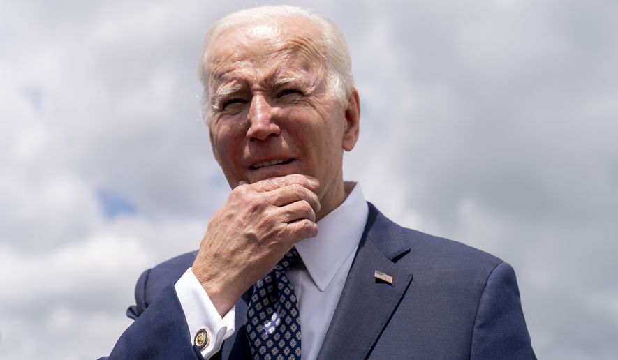 President Joe Biden speaks before boarding Air Force One at Buffalo-Niagara International Airport in Buffalo, N.Y., Tuesday, May 17, 2022, after paying their respects and speak to families of the victims of Saturday&#39;s shooting at a supermarket. (AP Photo/Andrew Harnik)