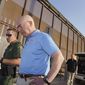 Homeland Security Secretary Alejandro Mayorkas tours a section of the border wall with Mexico, Tuesday, May 17, 2022, in Hidalgo, Texas. (Joel Martinez/The Monitor via AP, Pool)