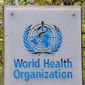 The logo and building of the World Health Organization (WHO) headquarters in Geneva, Switzerland, 15 April 2020. An expert group convened by the World Health Organization says there may be some benefit to giving a second booster dose of coronavirus vaccine to the most vulnerable people amid the continuing global spread of omicron and its subvariants. In a statement issued on Tuesday, May 17 2022 the U.N. health agency said there was increasing evidence that a second booster dose of COVID-19 vaccine would benefit health workers, people over age 60 and those with weak immune systems. (Martial Trezzini/Keystone via AP, file)