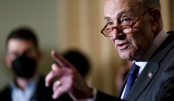 Senate Majority Leader Chuck Schumer, D-N.Y., meets with reporters at the Capitol in Washington, Wednesday, May 18, 2022. (AP Photo/J. Scott Applewhite)