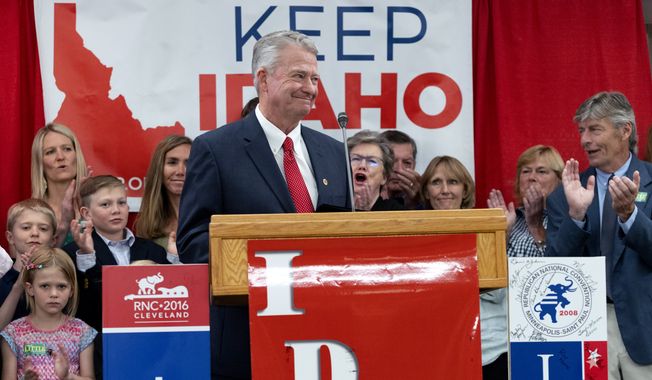 Idaho Gov. Brad Little is cheered by attendees and family after declaring victory in the gubernatorial primary during the Republican Party&#x27;s primary election celebration Tuesday, May 17, 2022, at the Hilton Garden Inn hotel in Boise, Idaho. (AP Photo/Kyle Green)