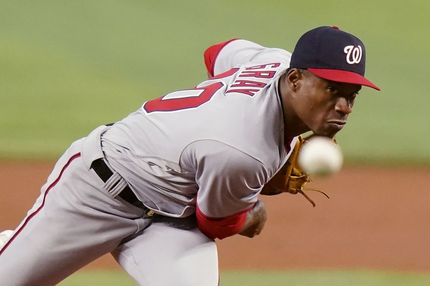 Washington Nationals starting pitcher Josiah Gray throws during the first inning of a baseball game against the Miami Marlins, Wednesday, May 18, 2022, in Miami. (AP Photo/Lynne Sladky)
