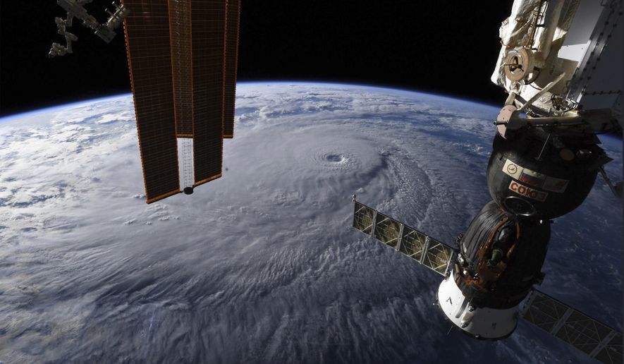 In this Aug. 22, 2018 file photo, provided by NASA, Hurricane Lane approaches Hawaii as seen from the International Space Station. (NASA via AP, File)