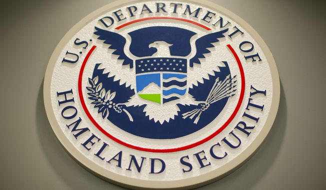 Homeland Security logo is seen during a joint news conference in Washington, Feb. 25, 2015.  (AP Photo/Pablo Martinez Monsivais, File)
