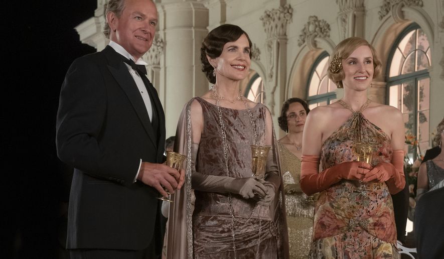 This image released by Focus Features shows Hugh Bonneville, from left, Elizabeth McGovern and Laura Carmichael in a scene from &amp;quot;Downton Abbey: A New Era.&amp;quot; (Ben Blackall/Focus Features via AP)