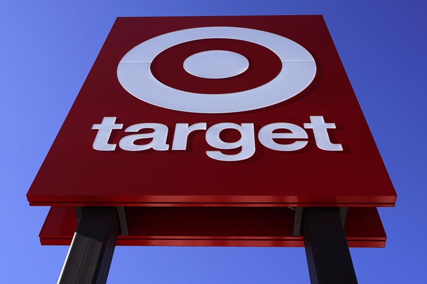 The bullseye logo on a sign outside a Target store is seen on Feb. 28, 2022. Target&#39;s first-quarter profit took a big hit from higher costs, despite strong sales growth. Target&#39;s results Wednesday, May 18, reflect the pressure on retailers&#39; profits coming from surging inflation and persistent clogs in the supply chain. (AP Photo/Charles Krupa, File)