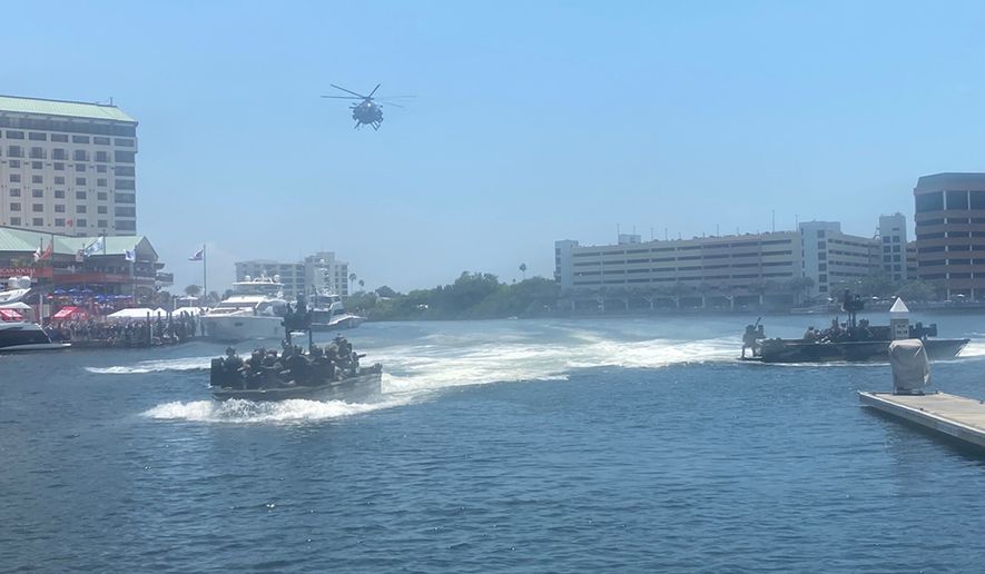 Special operations teams from the U.S. and 10 partner nations gave a stunning demonstration to a conference crowd Wednesday afternoon in Tampa, Florida. (Ben Wolfgang/The Washington Times)