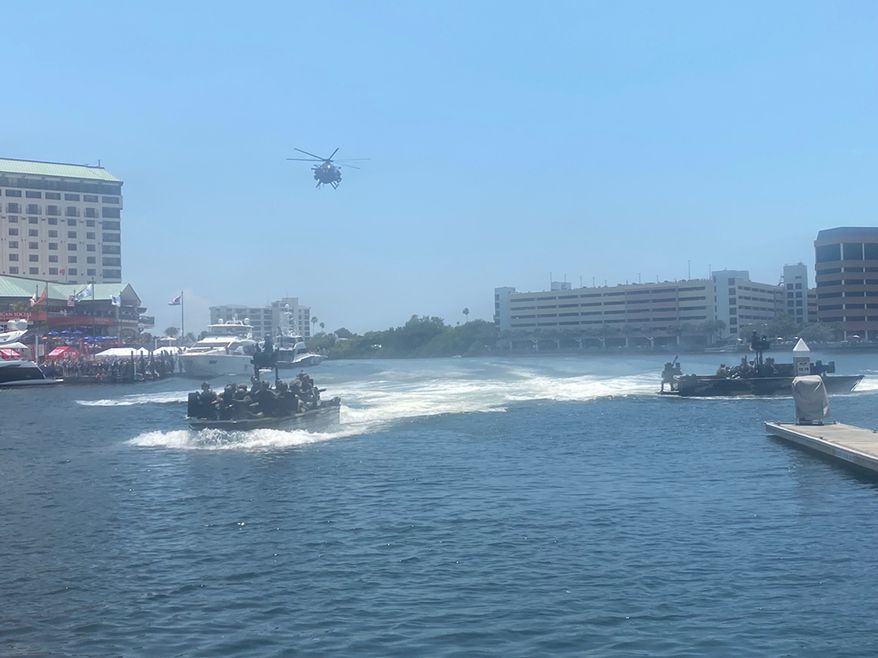 Special operations teams from the U.S. and 10 partner nations gave a stunning demonstration to a conference crowd Wednesday afternoon in Tampa, Florida. (Ben Wolfgang/The Washington Times)