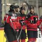 Canada&#39;s players celebrate after scoring during the group A Hockey World Championship match between Canada and Kazakhstan in Helsinki, Finland, Thursday May 19 2022. (AP Photo/Martin Meissner)