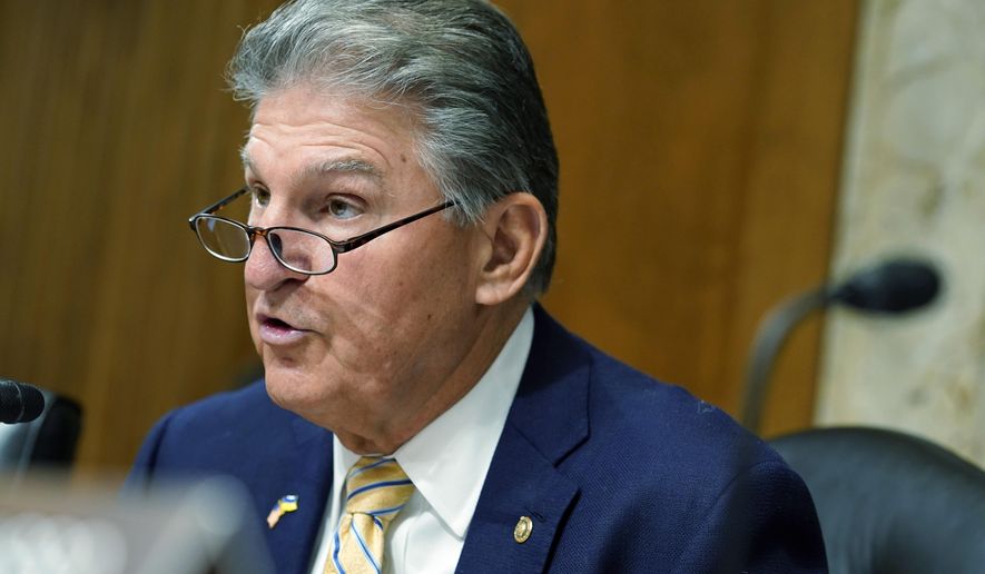 Sen. Joe Manchin, D-W.Va., is seen in this Thursday, May 5, 2022, file photo on Capitol Hill in Washington. Mr. Manchin is among a number of senators from both major parties calling on the Pentagon to shore up its stockpile of critical minerals needed to manufacture modern military technologies for which they say the U.S. has become increasingly reliant on China as a source.(AP Photo/Mariam Zuhaib) **FILE**