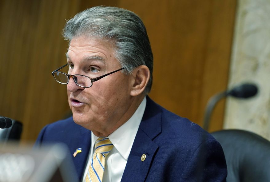 Sen. Joe Manchin, D-W.Va., is seen in this Thursday, May 5, 2022, file photo on Capitol Hill in Washington. Mr. Manchin is among a number of senators from both major parties calling on the Pentagon to shore up its stockpile of critical minerals needed to manufacture modern military technologies for which they say the U.S. has become increasingly reliant on China as a source.(AP Photo/Mariam Zuhaib) **FILE**