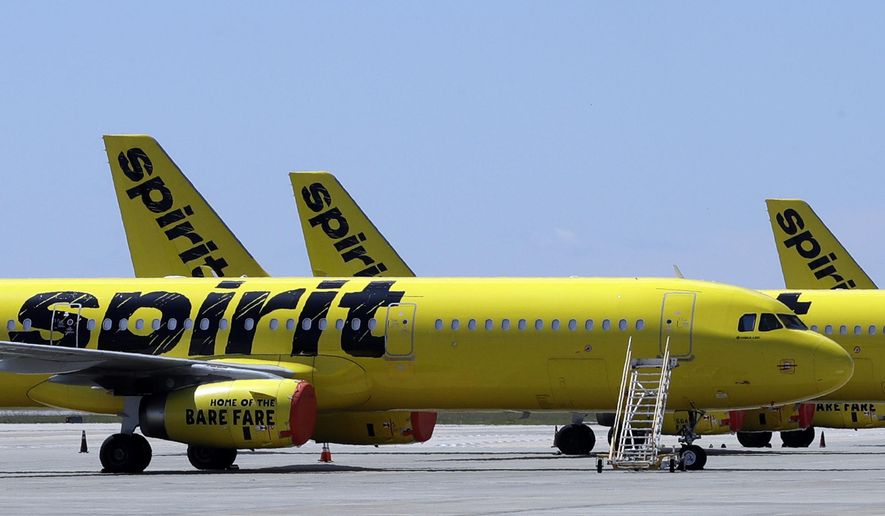 A line of Spirit Airlines jets sit on the tarmac at the Orlando International Airport on May 20, 2020, in Orlando, Fla. Spirit Airlines&#39; board is telling its shareholders to reject JetBlue&#39;s offer, saying it&#39;s not in the best interests of the company or its stockholders. Spirit said Thursday, May 19, 2022, that its board found that a potential deal with JetBlue faces substantial regulatory hurdles, especially while the Northeast Alliance with American Airlines remains in effect. (AP Photo/Chris O&#39;Meara, File)