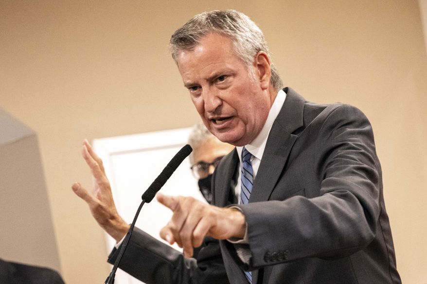 In this file photo, Bill de Blasio speaks during a news conference, Sept. 27, 2021, in New York.   The former New York City Mayor says he will run for Congress in a redrawn district that includes his Brooklyn home. De Blasio announced Friday, May 20, 2022 on MSNBCs Morning Joe that he will seek the Democratic nomination for the 10th Congressional District.  (AP Photo/Jeenah Moon, File)  **FILE**