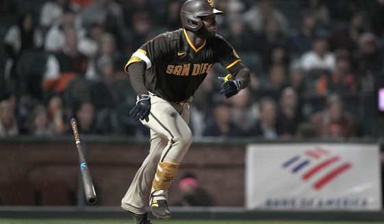 San Diego Padres&#39; Jurickson Profar watches his RBI single against the San Francisco Giants during the 10th inning of a baseball game in San Francisco, Friday, May 20, 2022. The Padres won 8-7 in 10 innings. (AP Photo/Tony Avelar)