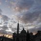 The sun sets behind St. Peter&#39;s Basilica, at the Vatican, Thursday, Dec. 5, 2019. The Vatican’s sprawling financial trial may not have produced any convictions yet or any new smoking guns. But recent testimony in May 2022 has provided plenty of insights into how the Vatican operates. (AP Photo/Gregorio Borgia, File)