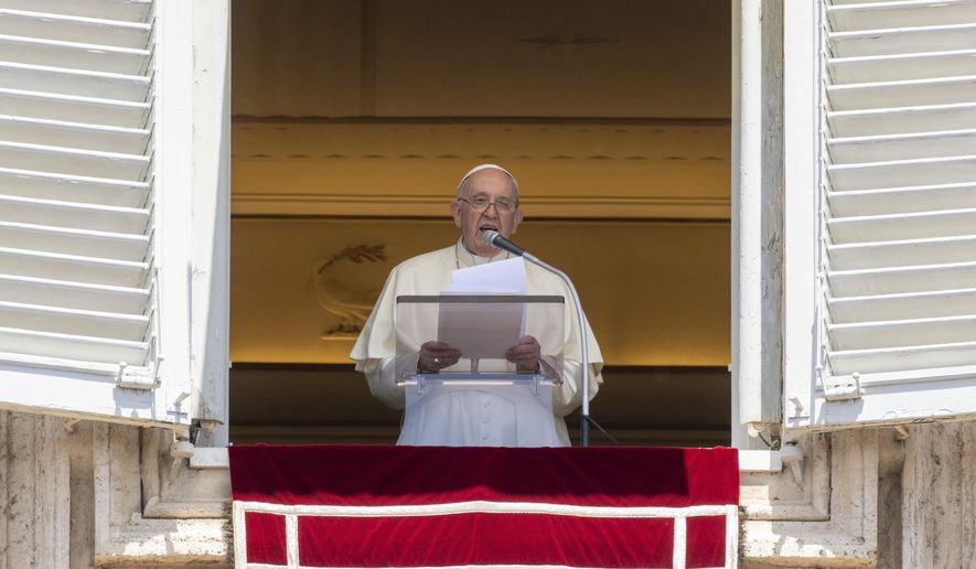 Pope Francis delivers his blessing as he recites the Regina Coeli noon prayer from the window of his studio overlooking St.Peter&#39;s Square, at the Vatican, Sunday, May 22, 2022. (AP Photo/Andrew Medichini)