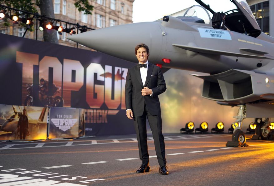 Tom Cruise poses for the media during the &#39;Top Gun Maverick&#39; UK premiere at a central London cinema, on Thursday, May 19, 2022. (AP Photo/Alberto Pezzali)