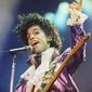 Prince performs at the Forum in Inglewood, Calif., on  Feb. 18, 1985. A reworked and re-released concert that captures Prince &amp;amp; The Revolution at their peak is coming next month.  Prince and The Revolution: Live” will be released June 3 in a variety of formats, including digital streaming platforms, a three-LP vinyl version, a two-CD version and a Blu-ray of the concert film. (AP Photo/Liu Heung Shing, File)