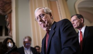 Senate Minority Leader Mitch McConnell, R-Ky., speaks with reporters following a closed-door policy lunch at the Capitol in Washington, Tuesday, May 24, 2022. (AP Photo/J. Scott Applewhite)
