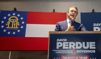David Perdue concedes the primary Republican governor&#x27;s race to Brian Kemp during his election party on Tuesday, May 24, 2022, in Atlanta. (Jenni Girtman/Atlanta Journal-Constitution via AP)