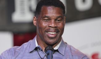 Herschel Walker, GOP candidate for the US Senate for Georgia, speaks at a primary watch party Monday, May 23, 2022, at the Foundry restaurant in Athens, Ga., near the University of Georgia where once played football. (AP Photo/Akili-Casundria Ramsess)
