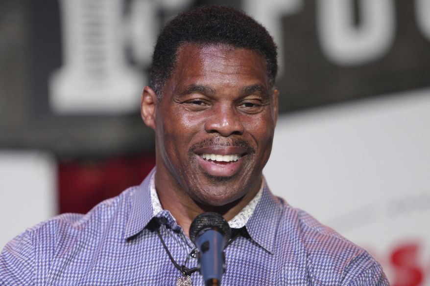 Herschel Walker, GOP candidate for the US Senate for Georgia, speaks at a primary watch party Monday, May 23, 2022, at the Foundry restaurant in Athens, Ga., near the University of Georgia where once played football. (AP Photo/Akili-Casundria Ramsess)