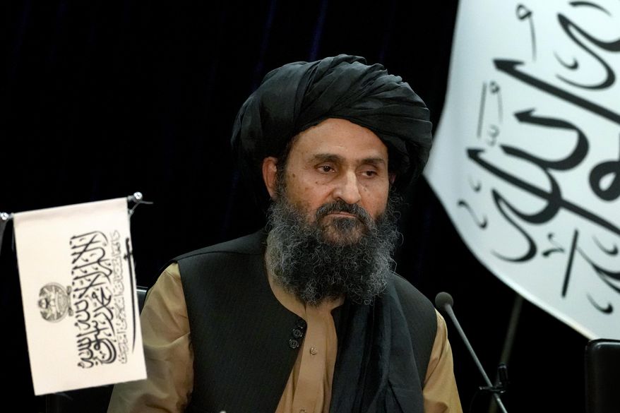 Mullah Abdul Ghani Baradar, Acting Deputy Prime Minister of the Afghan Taliban&#x27;s caretaker government, speaks during a document signing ceremony in Kabul, Afghanistan, Tuesday, May 24, 2022. The Taliban said Tuesday that they&#x27;ve signed a deal allowing Abu Dhabi-based GAAC Solutions to manage the airports in Herat, Kabul and Kandahar. (AP Photo/Ebrahim Noroozi)