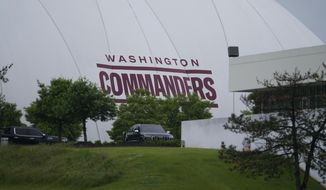 The Washington Commanders name is seen on their practice bubble at the team&#39;s NFL football training facility, Tuesday, May 24, 2022 in Ashburn, Va. (AP Photo/Alex Brandon)