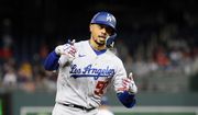 Los Angeles Dodgers&#39; Mookie Betts celebrates his home run as he rounds the bases during the fourth inning of a baseball game against the Washington Nationals, Tuesday, May 24, 2022, in Washington. (AP Photo/Nick Wass)