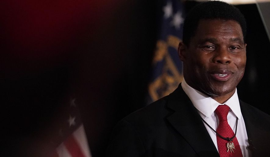 U.S. Senate candidate Herschel Walker speaks to supporters during an election night watch party, Tuesday, May 24, 2022, in Atlanta. Walker won the Republican nomination for U.S. Senate in Georgia&#39;s primary election. (AP Photo/Brynn Anderson)