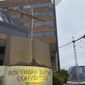 A cross and Bible sculpture stand outside the Southern Baptist Convention headquarters in Nashville, Tenn., on Tuesday, May 24, 2022. (AP Photo/Holly Meyer) ** FILE **