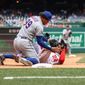 Outfielder Juan Soto (#22) slides/collides into Mets Pitcher Taijuan Walker (#99) at third base at Washington Nationals vs New York Mets on May 12th 2022 (Photography: All-Pro Reels/Alyssa Howell) **FILE**