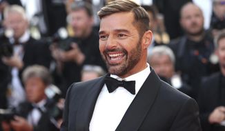Ricky Martin poses for photographers upon arrival at the premiere of the film &#39;Elvis&#39; at the 75th international film festival, Cannes, southern France, Wednesday, May 25, 2022. (Photo by Vianney Le Caer/Invision/AP)