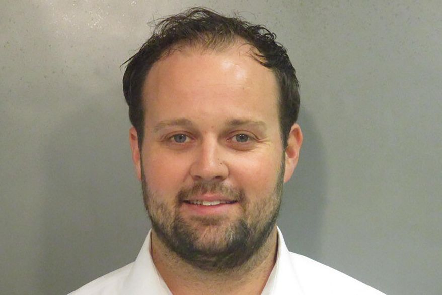 This undated photo provided by Washington County (Ark), Detention Center shows Josh Duggar. The former reality TV star is returning to federal court in Arkansas, where a judge could sentence him to up to 20 years in prison for receiving and possessing child pornography. Prosecutors on Wednesday, May 25, 2022 are seeking a maximum sentence for Duggar, whose large family was the focus of TLC’s “19 Kids and Counting” reality show. (Washington County Detention Center via AP)
