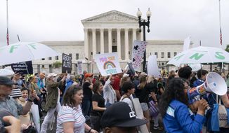 Abortion-rights demonstrators coming from the Washington Monument march past the Supreme Court in Washington, Saturday, May 14, 2022. (AP Photo/Jacquelyn Martin) ** FILE **