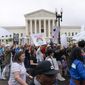Abortion-rights demonstrators coming from the Washington Monument march past the Supreme Court in Washington, Saturday, May 14, 2022. (AP Photo/Jacquelyn Martin) **FILE**