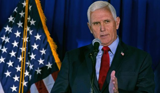 Former Vice President Mike Pence gestures during his address at a luncheon, Thursday, May 26, 2022, in Bedford, N.H. (AP Photo/Charles Krupa)
