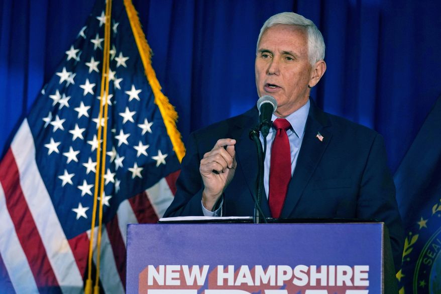 Former Vice President Mike Pence gestures during his address at a luncheon, Thursday, May 26, 2022, in Bedford, N.H. (AP Photo/Charles Krupa)