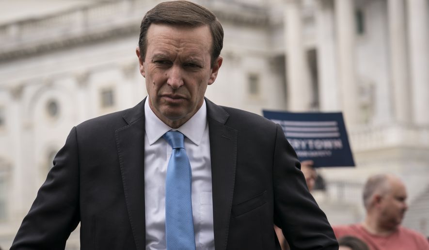 Sen. Chris Murphy, D-Conn., a gun control advocate, waits to speak to activists demanding action on gun control legislation after a gunman killed 19 children and two teachers in a Texas elementary school this week, at the Capitol in Washington, Thursday, May 26, 2022. (AP Photo/J. Scott Applewhite)