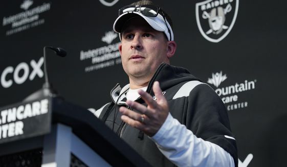 Las Vegas Raiders head coach Josh McDaniels speaks during a news conference at the NFL football team&#39;s practice facility Thursday, May 26, 2022, in Henderson, Nev. (AP Photo/John Locher)