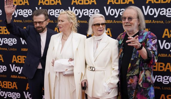 Members of ABBA, from left, Bjorn Ulvaeus, Agnetha Faltskog, Anni-Frid Lyngstad and Benny Andersson arrive for the ABBA Voyage concert at the ABBA Arena in London, Thursday May 26, 2022. ABBA is releasing its first new music in four decades, along with a concert performance that will see the &amp;quot;Dancing Queen&amp;quot; quartet going entirely digital. The virtual version of the band will begin a series of concerts on Thursday. (AP Photo/Alberto Pezzali)